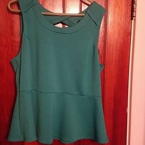 Turquoise sleeveless peplum top